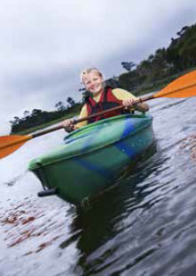 child kayaking