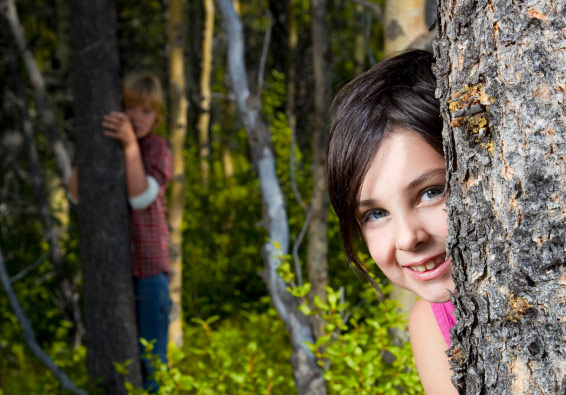 girl child kid hiding tree play