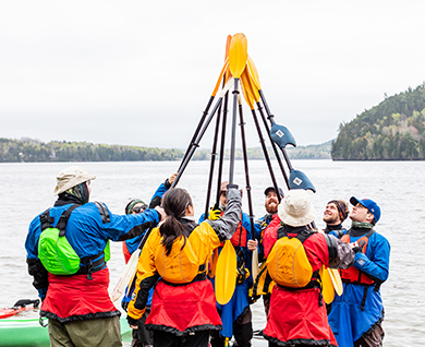 ccc participants with canoe paddles