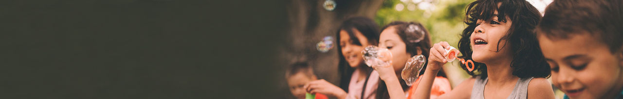 kids outside bubbles